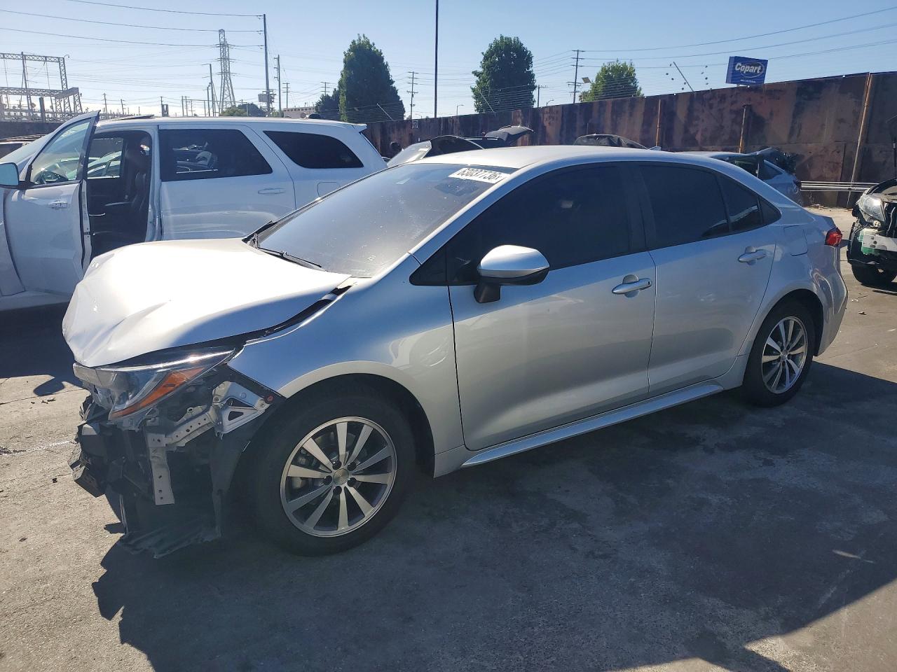2021 Toyota Corolla LE, VIN JTDEPMAE1MJ166885 — Front end