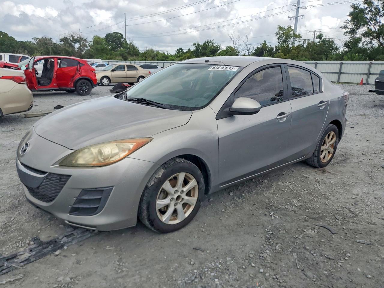 2010 Mazda 3 i Touring, VIN JM1BL1SF6A1184606 — Бок