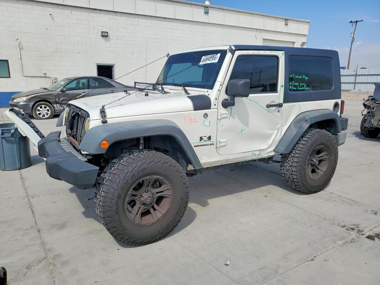 2009 Jeep Wrangler X, VIN 1J4FA24199L784545 — Side