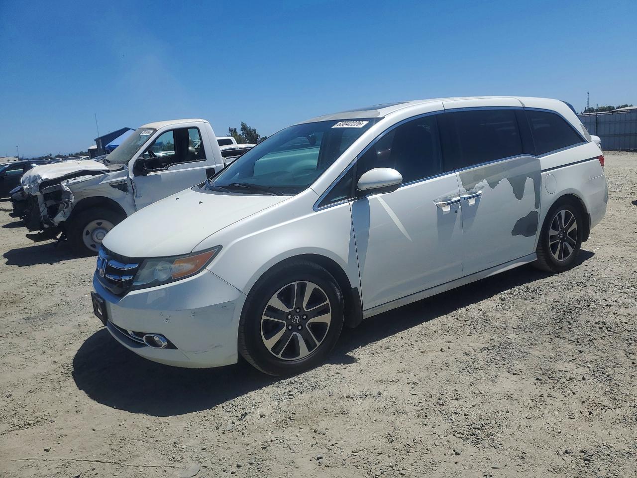 2014 Honda Odyssey Touring, VIN 5FNRL5H91EB071800 — Мелкие вмятины и царапины