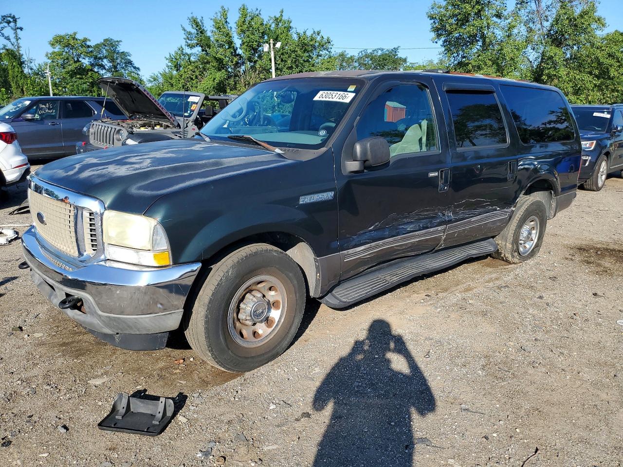 2002 Ford Excursion Special Serv, VIN 1FMNU40L82EA51680 — Бок