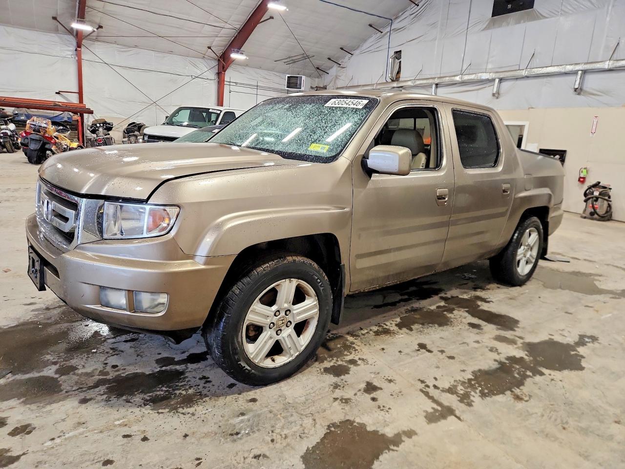 2009 Honda Ridgeline RTL, VIN 5FPYK16519B104525 — Minor dents and scratches