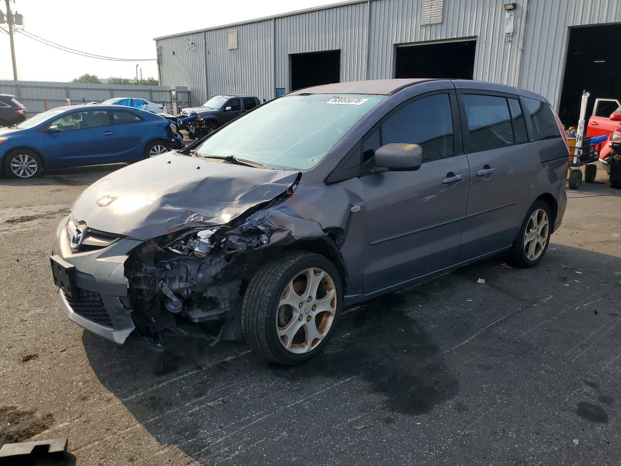 2009 Mazda 5 Sport, VIN JM1CR29L290353848 — Front end