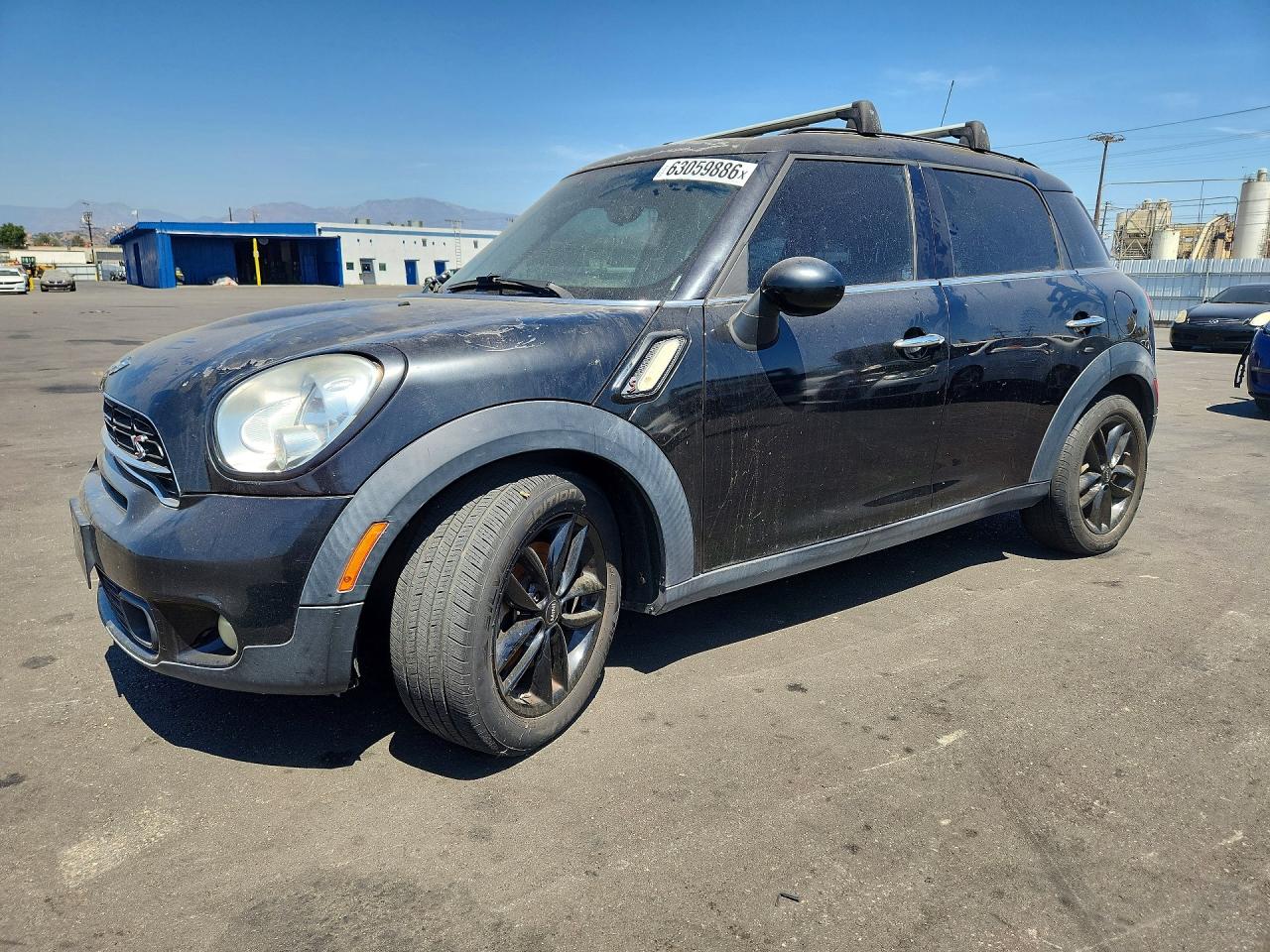 2016 MINI Countryman S, VIN WMWZC3C54GWT08834 — Side