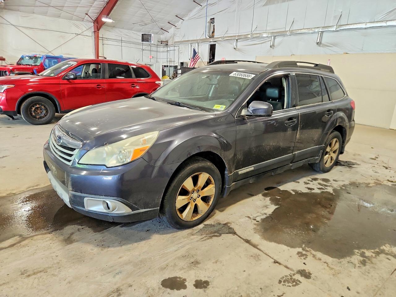 2010 Subaru Outback Limited Power Moon, VIN 4S4BRDKC3A2365853 — Side