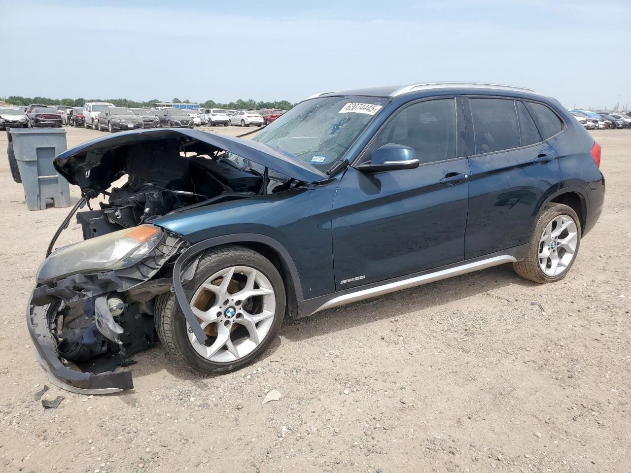 2015 BMW X1 sDrive28i, VIN WBAVM1C58FVW58407 — Front end