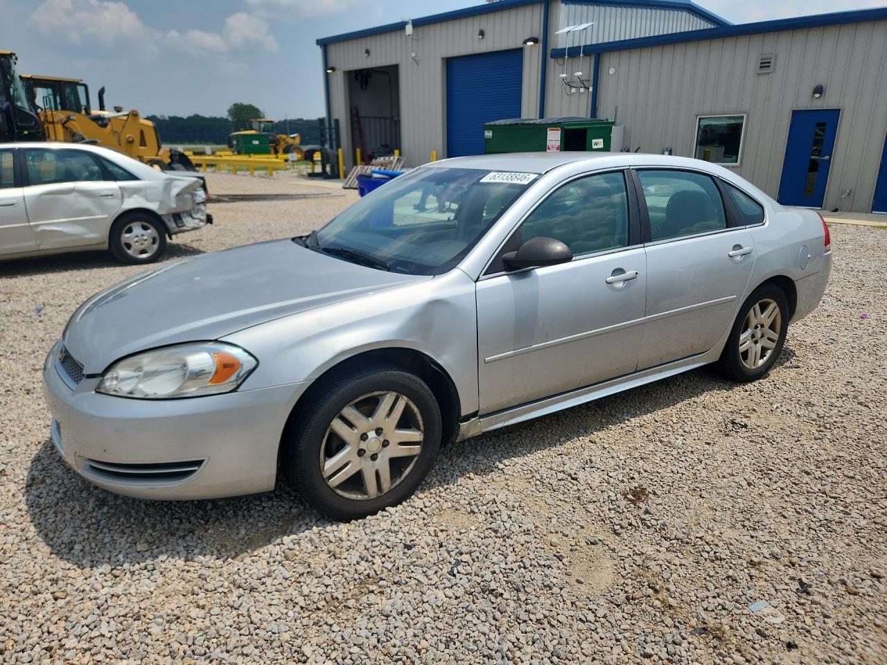 2016 Chevrolet Impala LT, VIN 2G1WB5E39G1172376 — Side