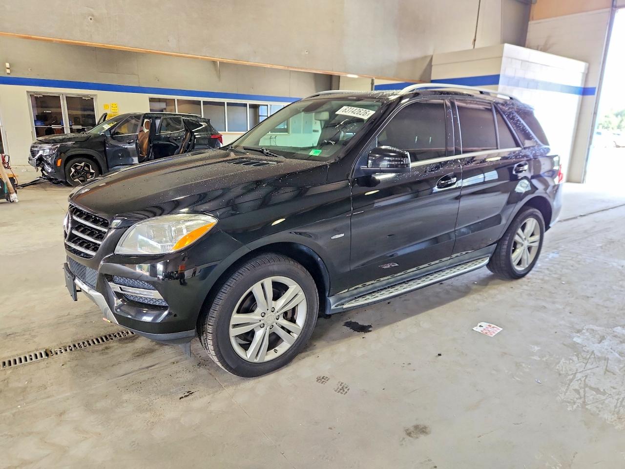 2012 Mercedes-Benz M 350, VIN 4JGDA2EB6CA023152 — Normal wear