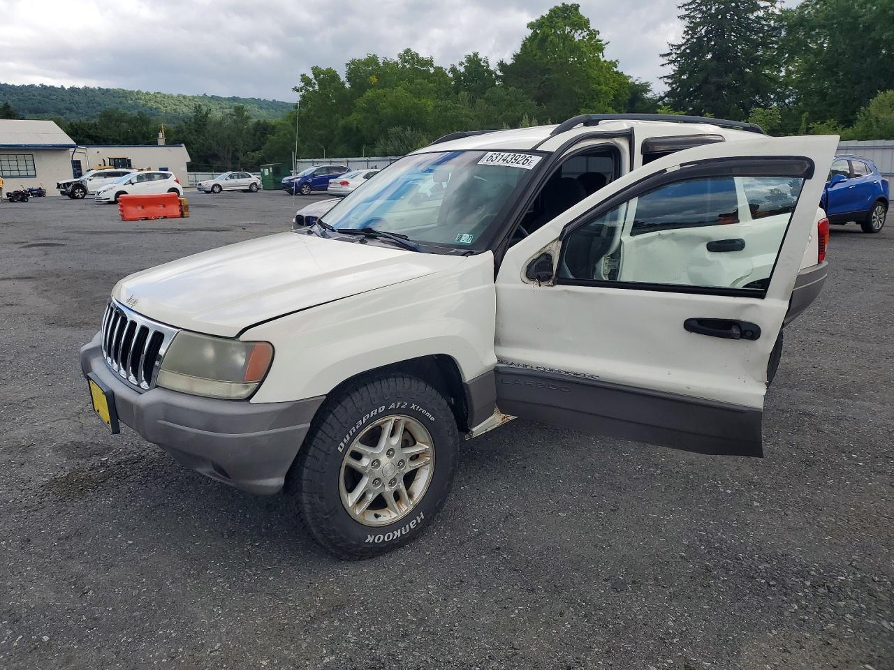 2003 Jeep Grand Cherokee Laredo, VIN 1J4GW48SX3C605828 — Side