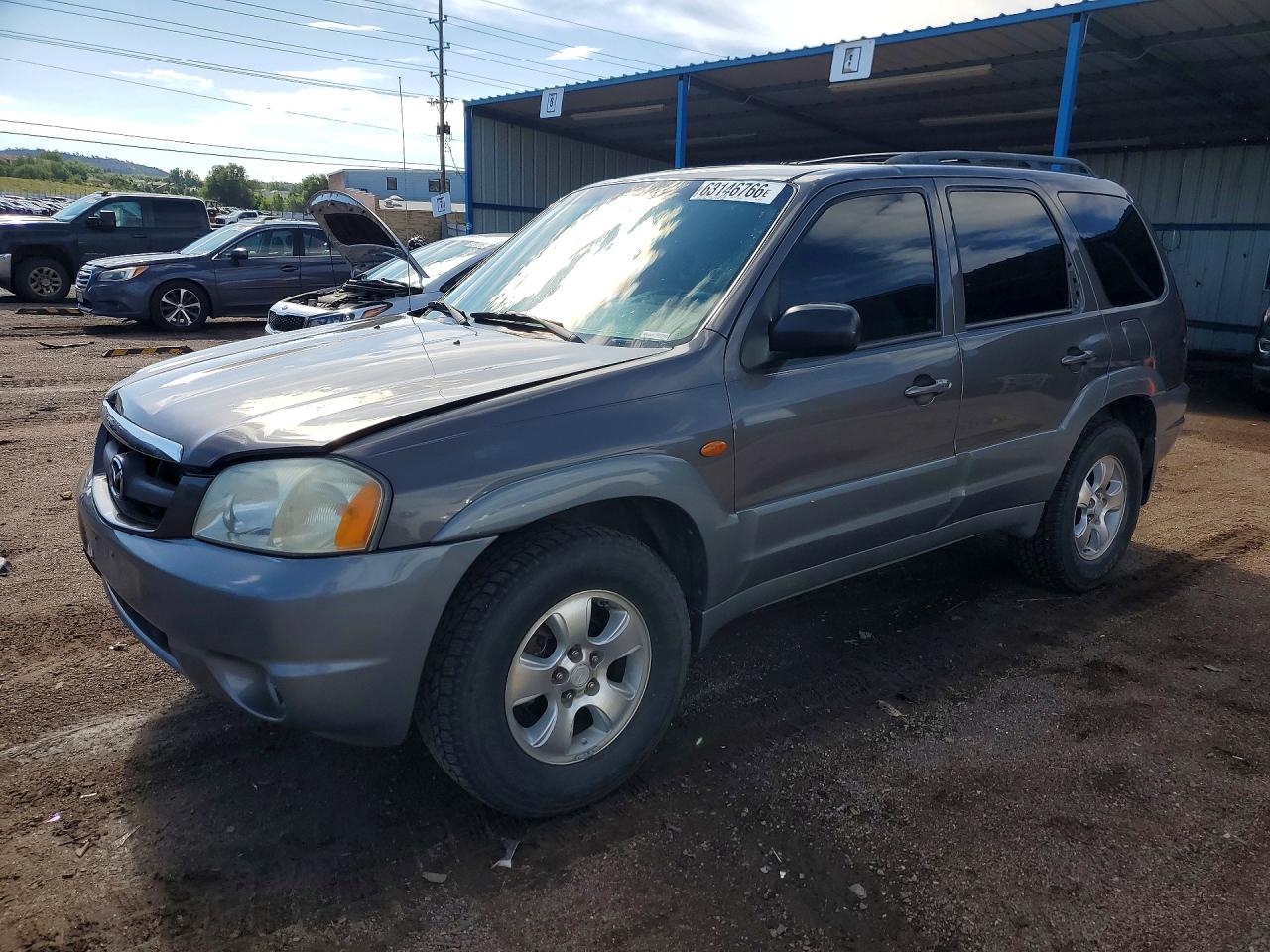2002 Mazda Tribute LX, VIN 4F2CU08192KM29546 — Hail