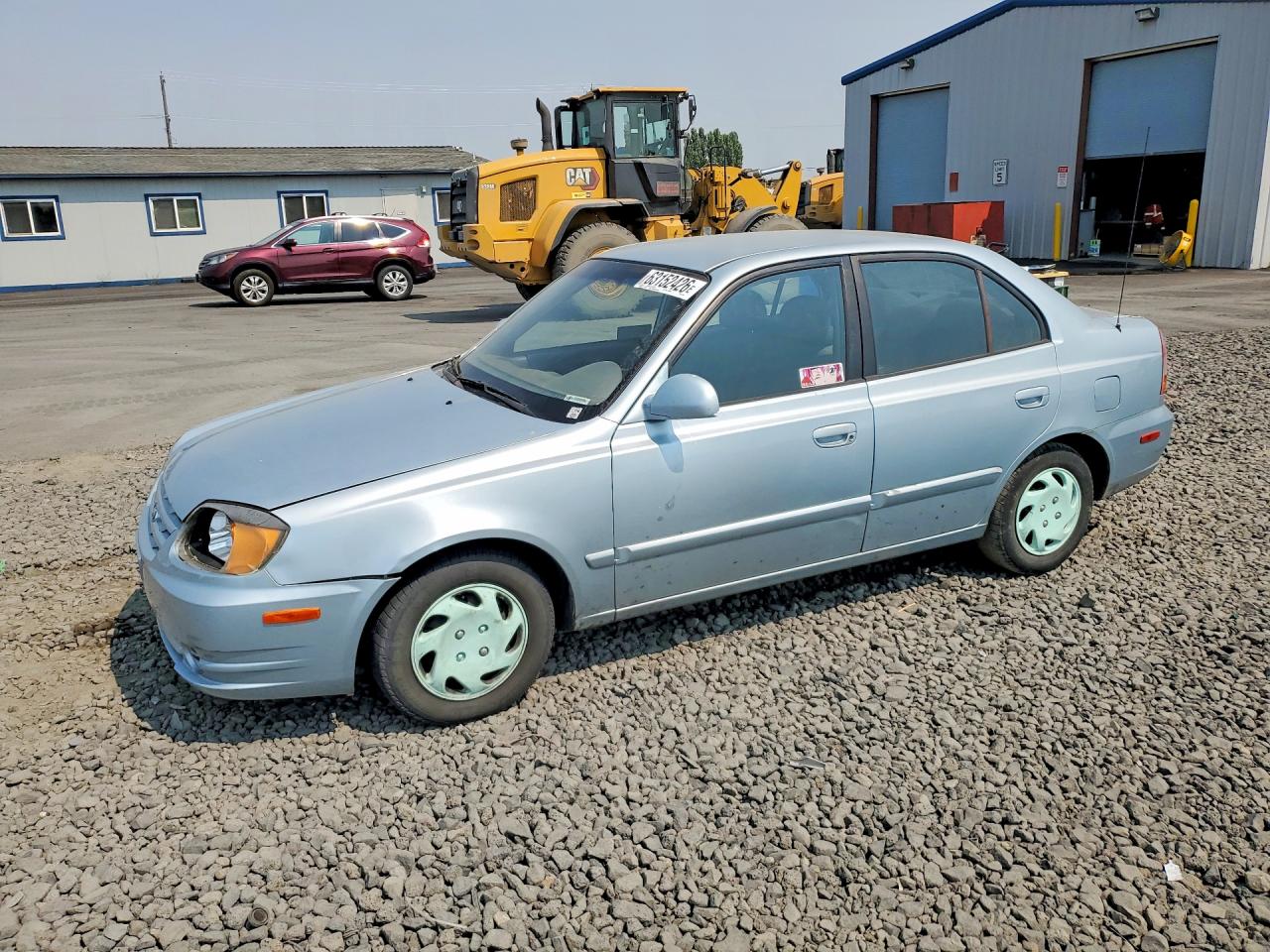 2005 Hyundai Accent GLS, VIN KMHCG45C75U615580 — Бок