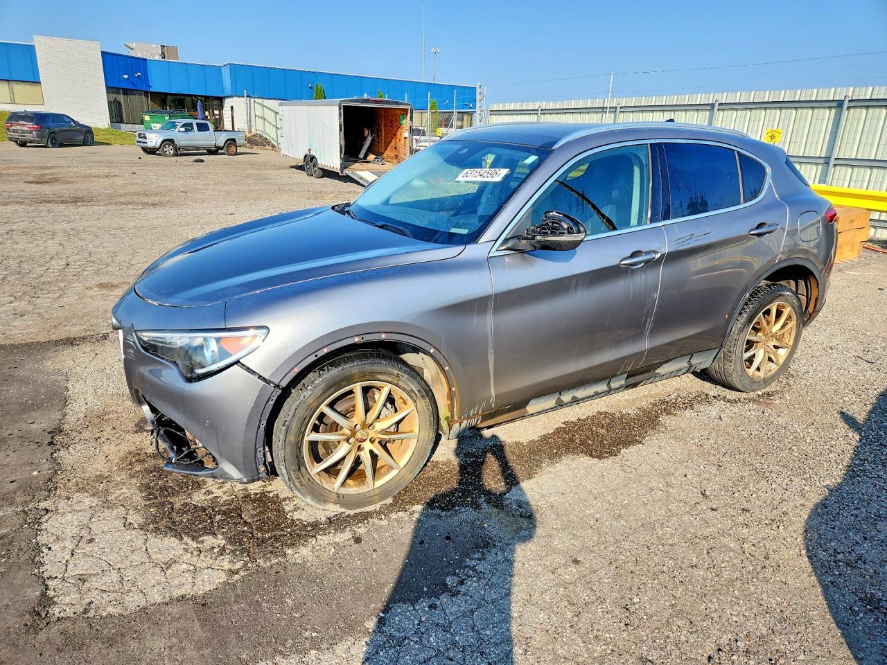 2018 Alfa Romeo Stelvio Ti, VIN ZASFAKBNXJ7B71902 — Перед