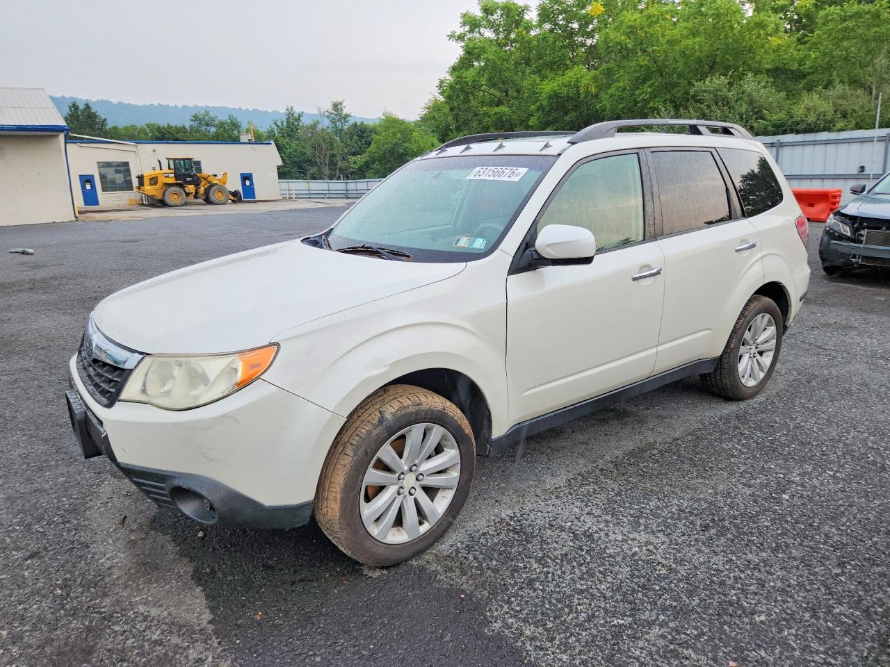 2012 Subaru Forester X Premium, VIN JF2SHADC7CH411933 — Бок