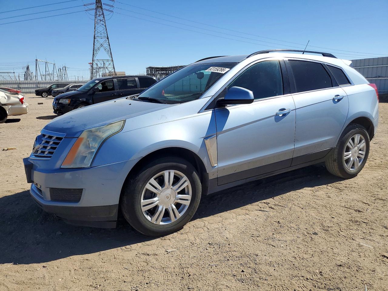 2013 Cadillac SRX, VIN 3GYFNAE32DS558851 — Front end