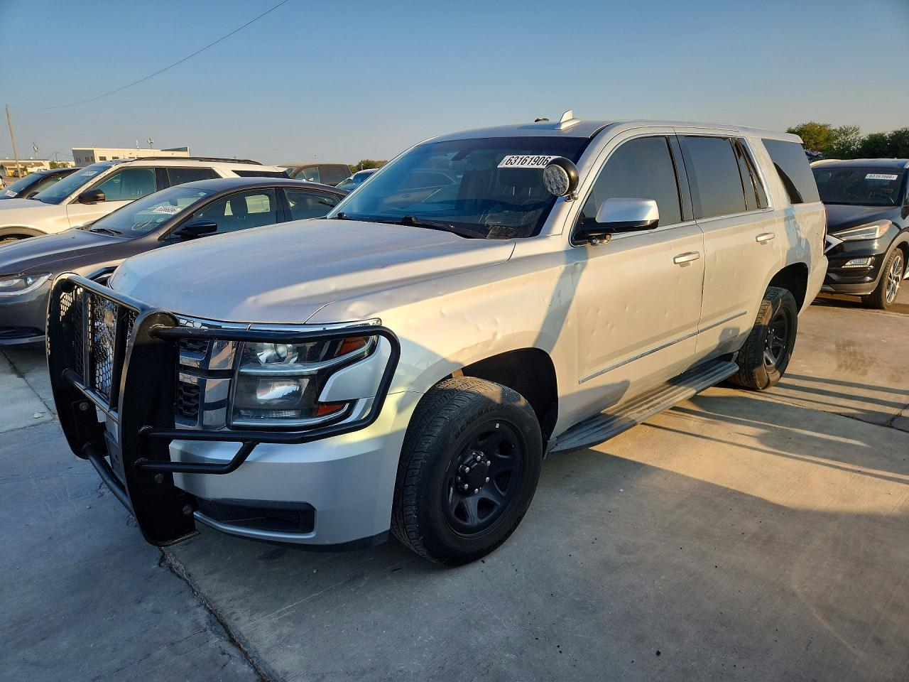 2018 Chevrolet Tahoe Commercial, VIN 1GNLCDEC6JR228555 — Град