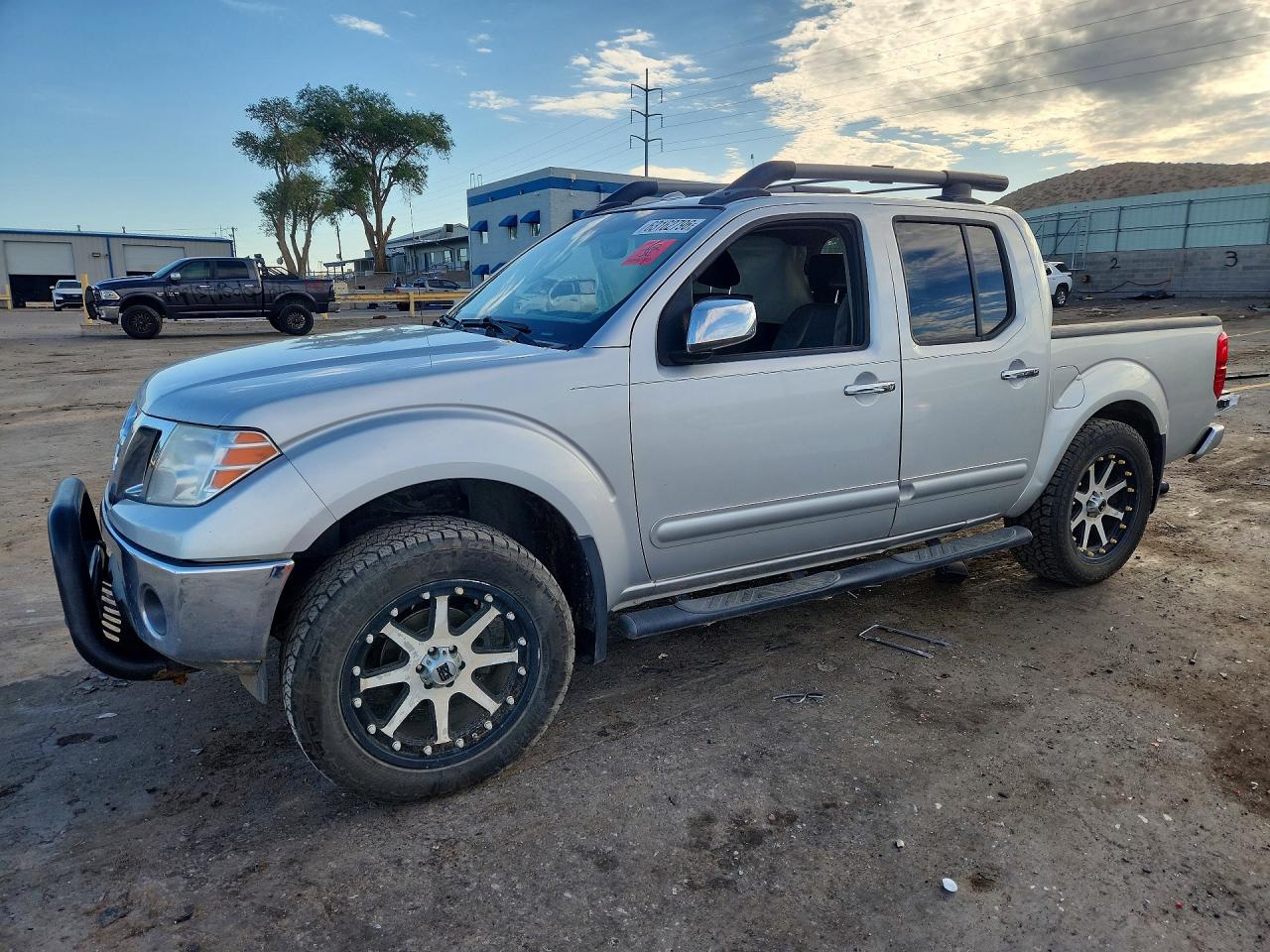 2010 Nissan Frontier LE, VIN 1N6AD0EV1AC423521 — Side