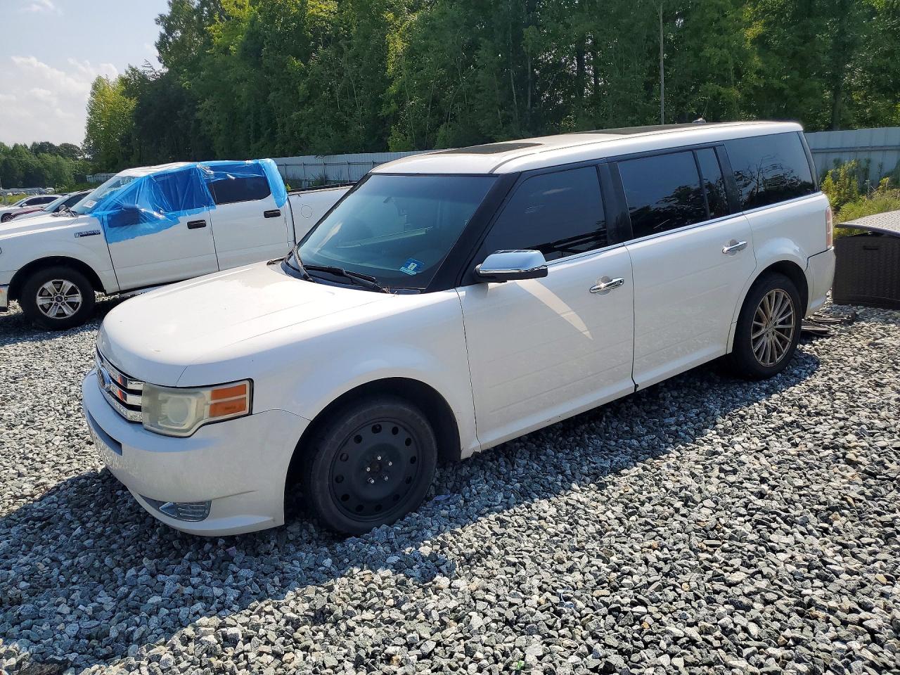 2009 Ford Flex Limited, VIN 2FMEK63C69BA15134 — Side