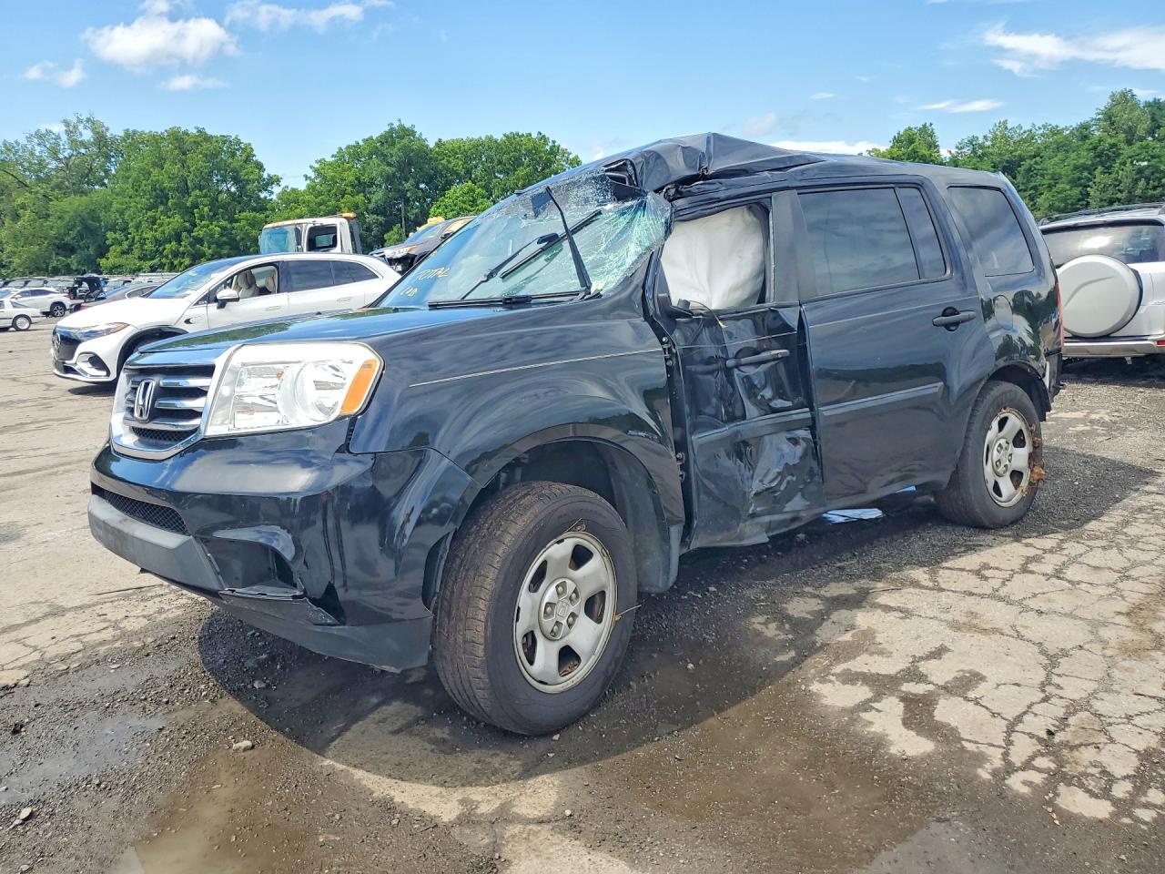 2014 Honda Pilot LX, VIN 5FNYF4H24EB022655 — Rollover