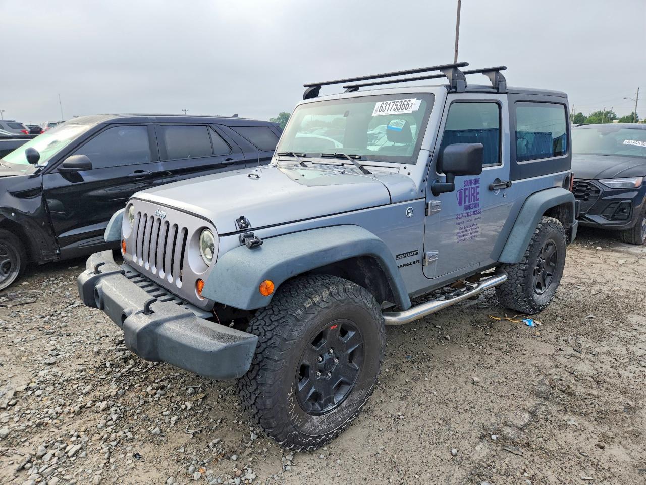 2013 Jeep Wrangler Sport, VIN 1C4AJWAG2DL647925 — Minor dents and scratches