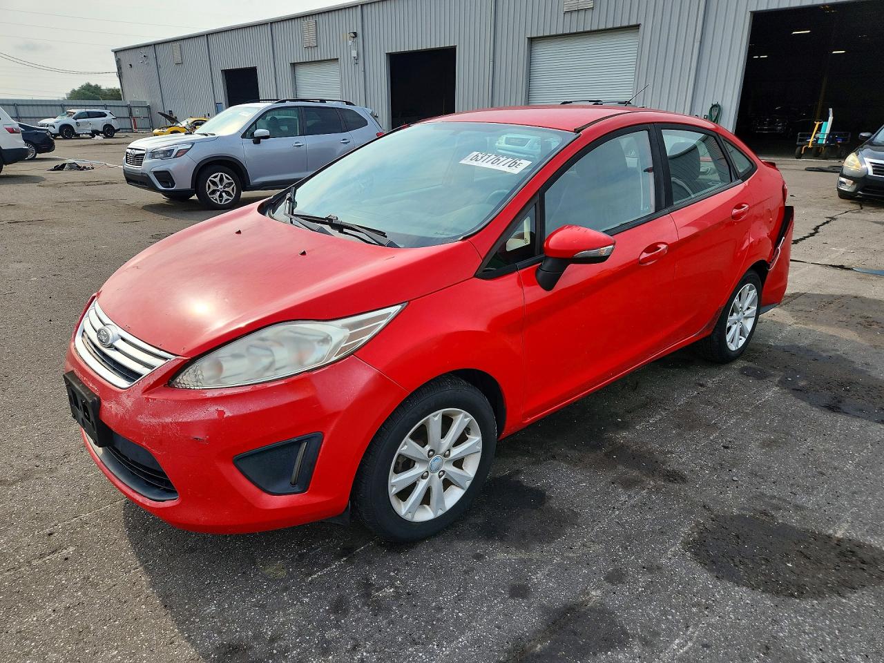 2013 Ford Fiesta SE, VIN 3FADP4BJ0DM175013 — Rear end