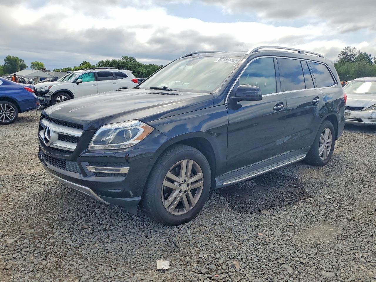 2015 Mercedes-Benz GL 450, VIN 4JGDF6EEXFA586700 — Minor dents and scratches