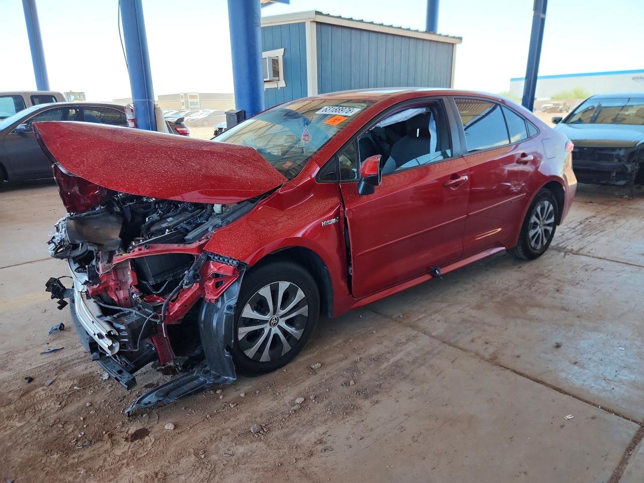 2021 Toyota Corolla Hybrid LE, VIN JTDEAMDE7MJ000433 — Front end