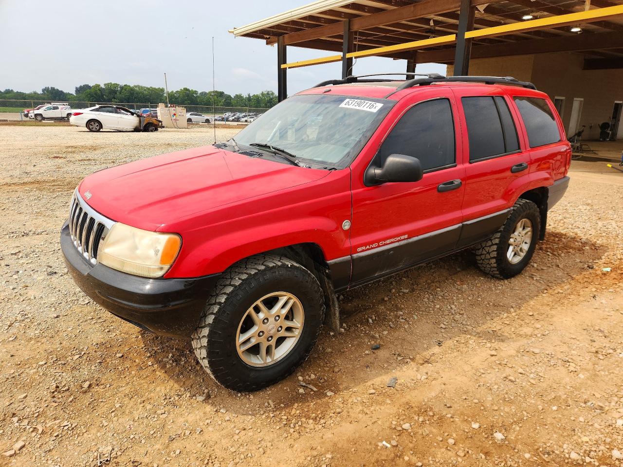 1999 Jeep Grand Cherokee Laredo, VIN 1J4GW58S8XC588362 — Minor dents and scratches