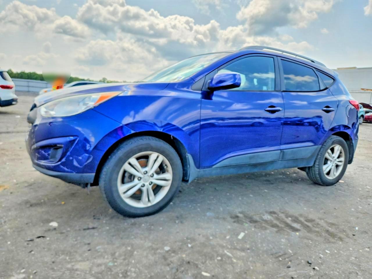 2011 Hyundai Tucson GLS, VIN KM8JUCAC8BU249298 — Vandalism