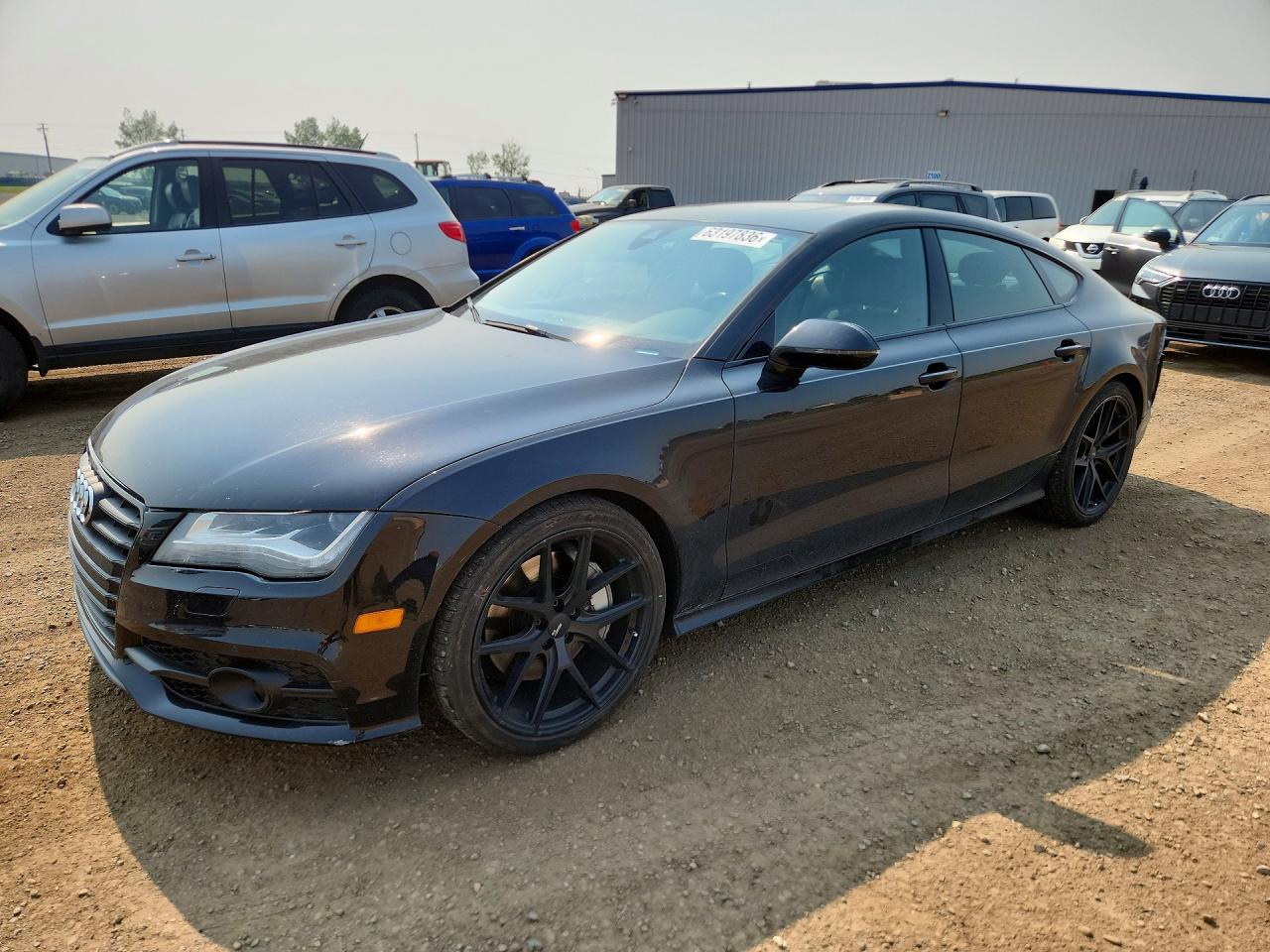 2014 Audi A7 Premium, VIN WAU3GCFCXEN031744 — Rear end