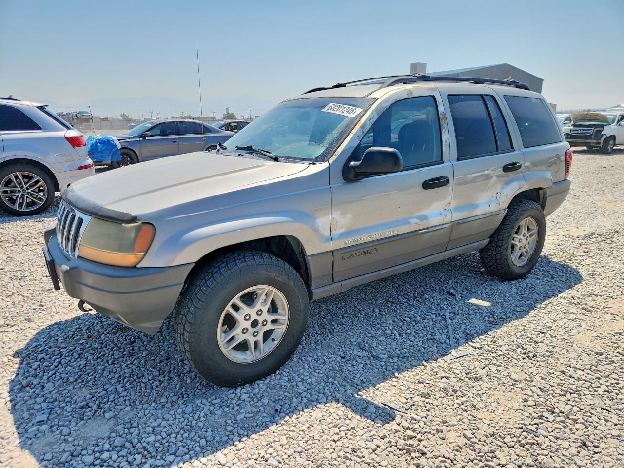 2002 Jeep Grand Cherokee Laredo, VIN 1J4GW48N12C183036 — Minor dents and scratches