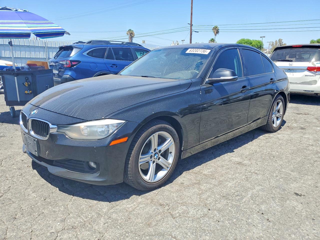 2014 BMW 3 Series 320i, VIN WBA3B1G55ENS78561 — Rear end