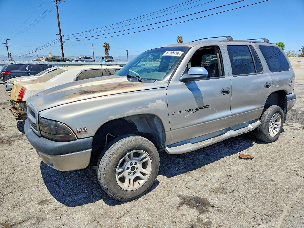 2000 Dodge Durango, VIN 1B4HS28N7YF149018 — Бок