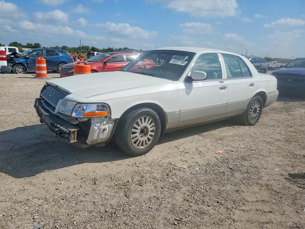 2008 Mercury Grand Marquis LS, VIN 2MEFM75V98X630638 — Side