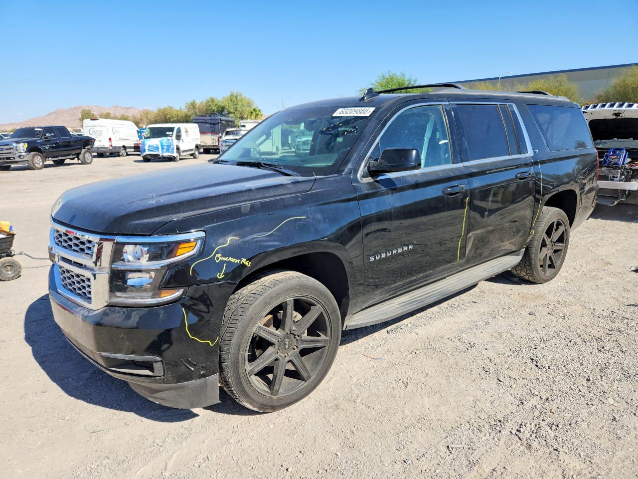 2017 Chevrolet Suburban LT, VIN 1GNSCHKC7HR236682 — Side