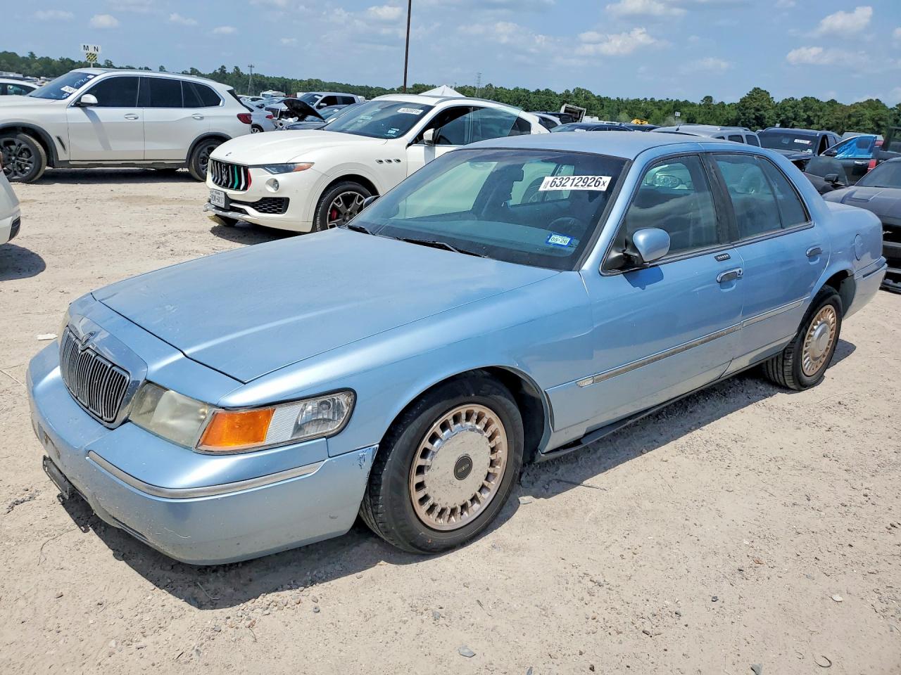 2001 Mercury Grand Marquis LS, VIN 2MEFM75WX1X676557 — Normal wear