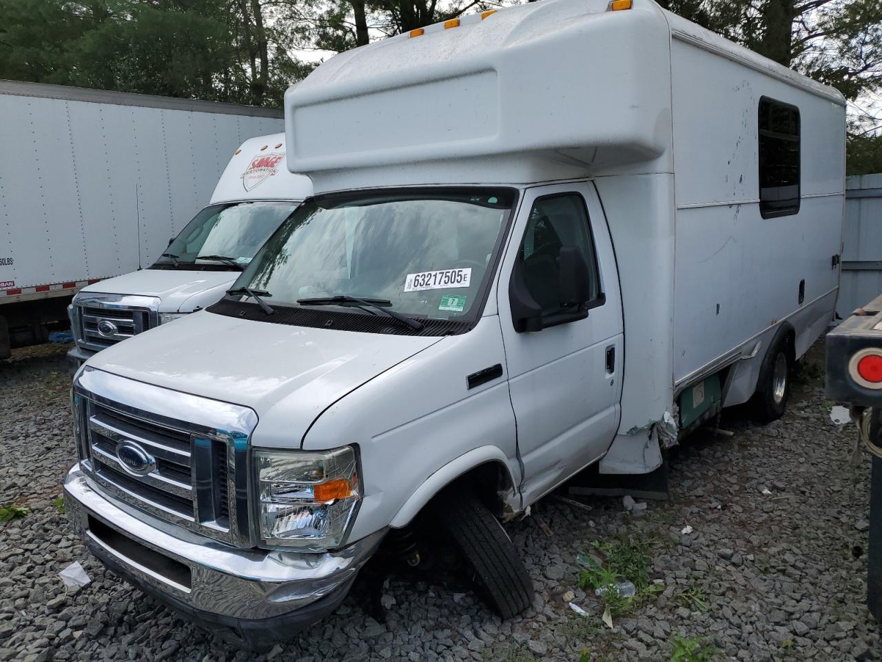 2011 Ford Econoline Commercial, VIN 1FDXE4FS2BDA86872 — Side