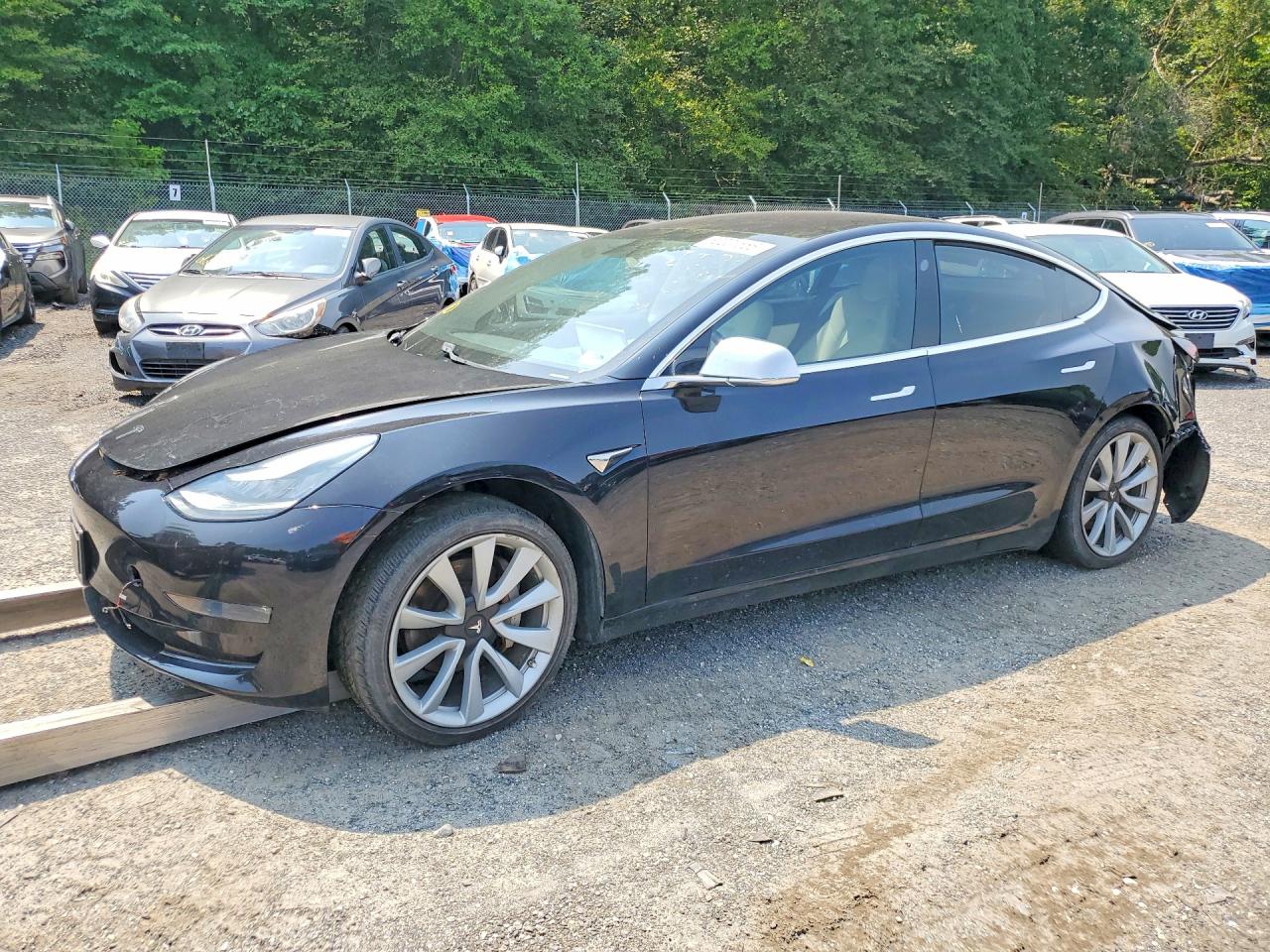 2018 Tesla Model 3 Long Range Battery, VIN 5YJ3E1EB0JF097072 — Rear end