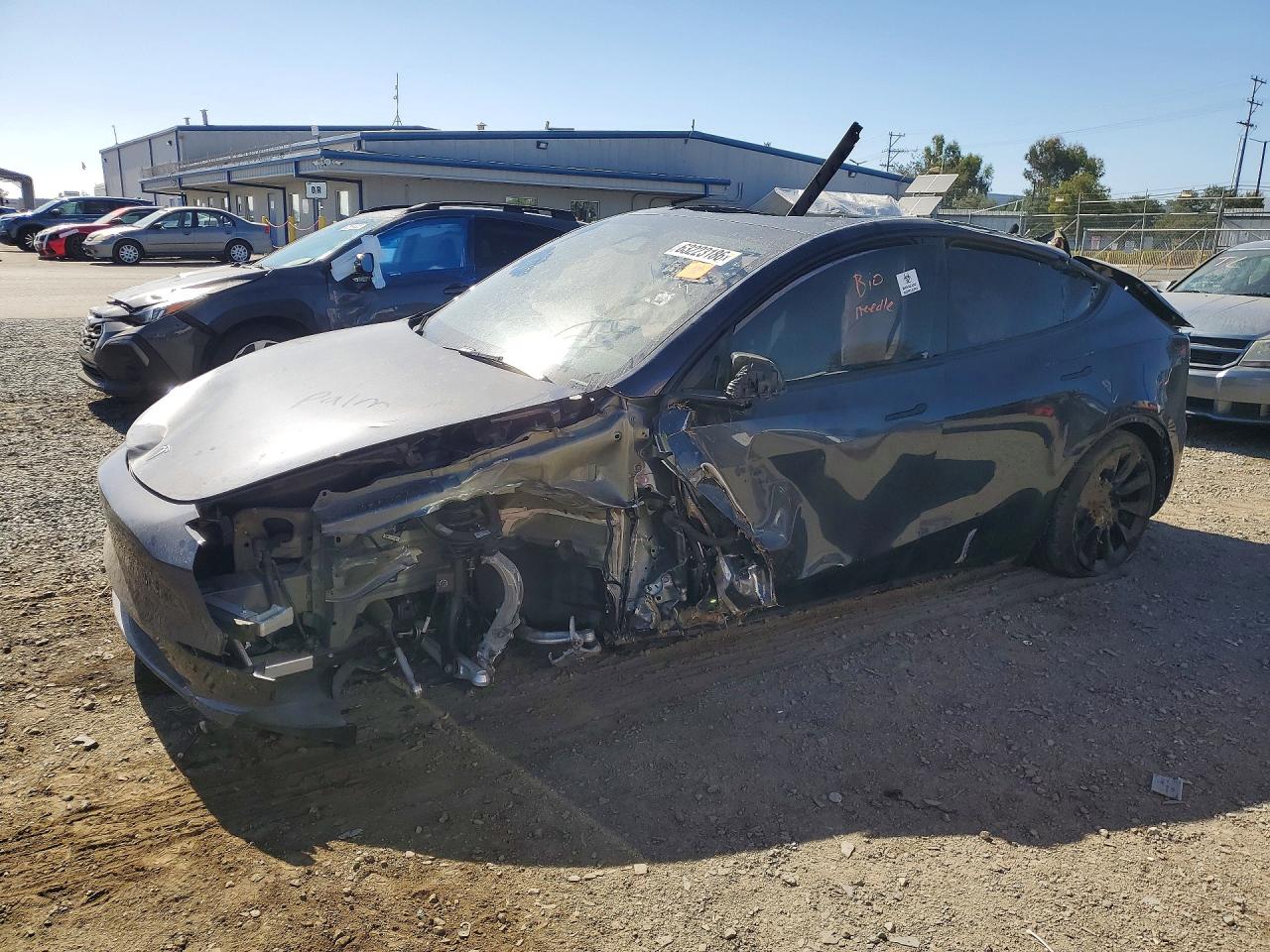 2024 Tesla Model Y Long Range, VIN 7SAYGDEE1RA233359 — Rollover