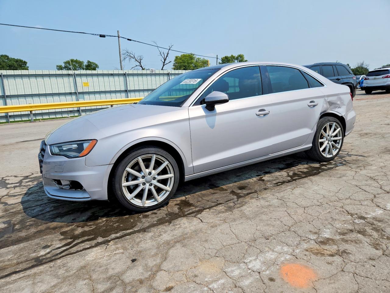 2015 Audi A3 Premium Plus, VIN WAUEFGFF8F1134716 — Side