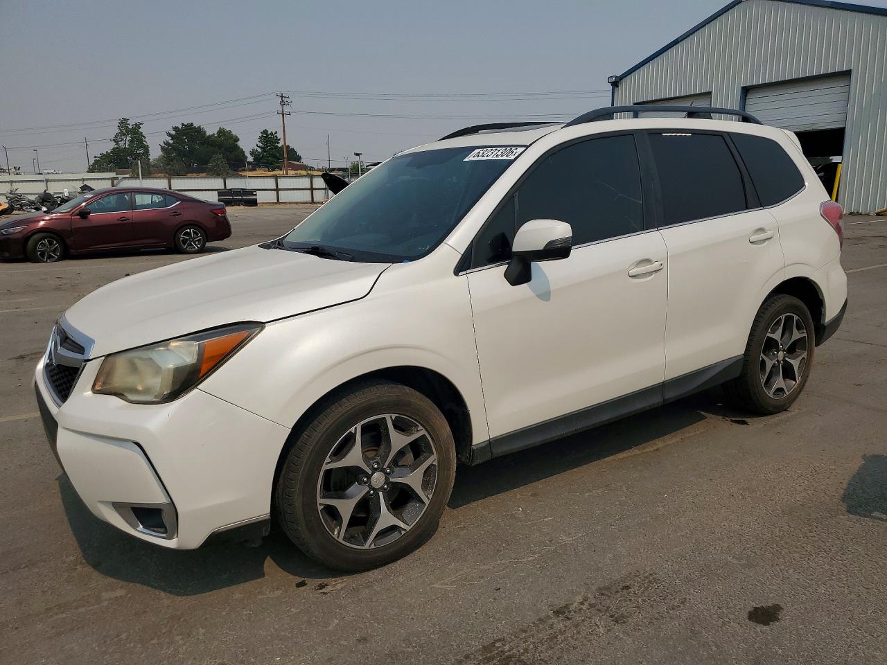 2014 Subaru Forester XT Touring, VIN JF2SJGMCXEH479802 — Перед