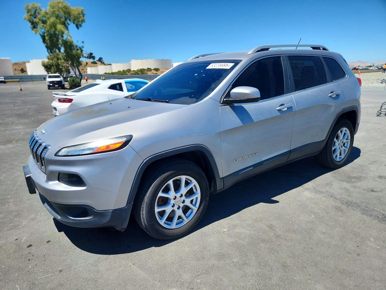 2014 Jeep Cherokee Latitude, VIN 1C4PJMCS8EW315424 — Vandalism
