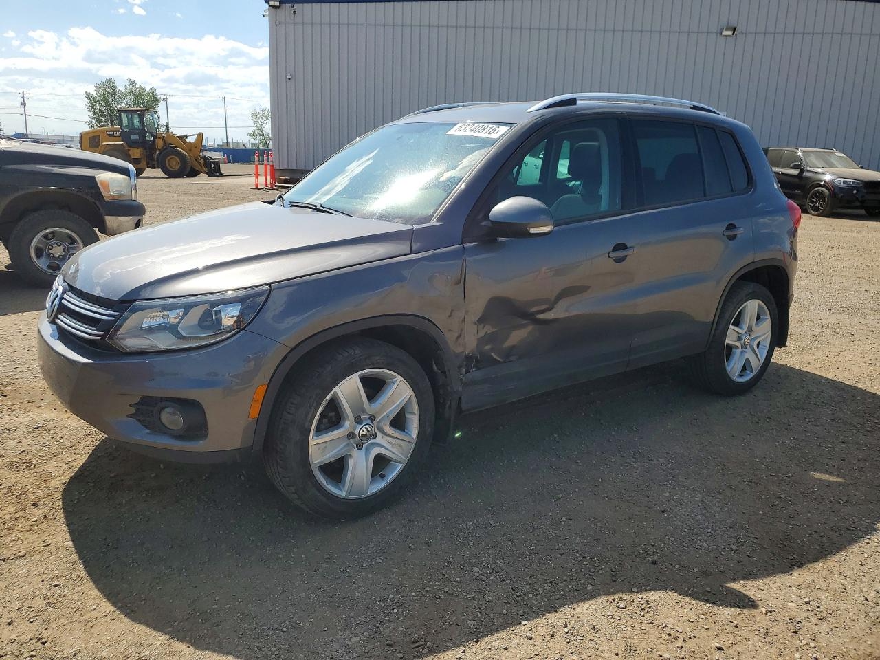 2015 Volkswagen Tiguan Comfortline, VIN WVGJV7AX7FW544216 — Side