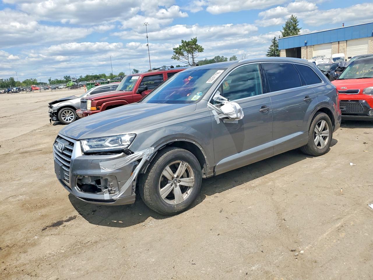 2017 Audi Q7 Premium Plus, VIN WA1LHAF74HD058403 — Side