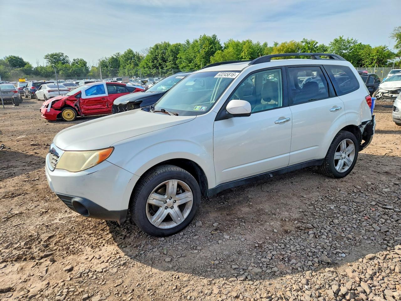 2009 Subaru Forester X Limited, VIN JF2SH64659H709185 — Зад
