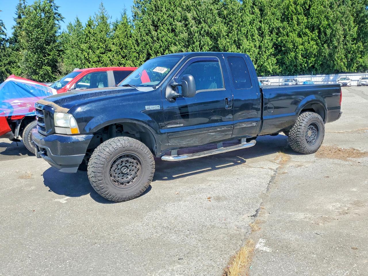 2002 Ford F-250 XL, VIN 1FTNX21F52EB99262 — Side