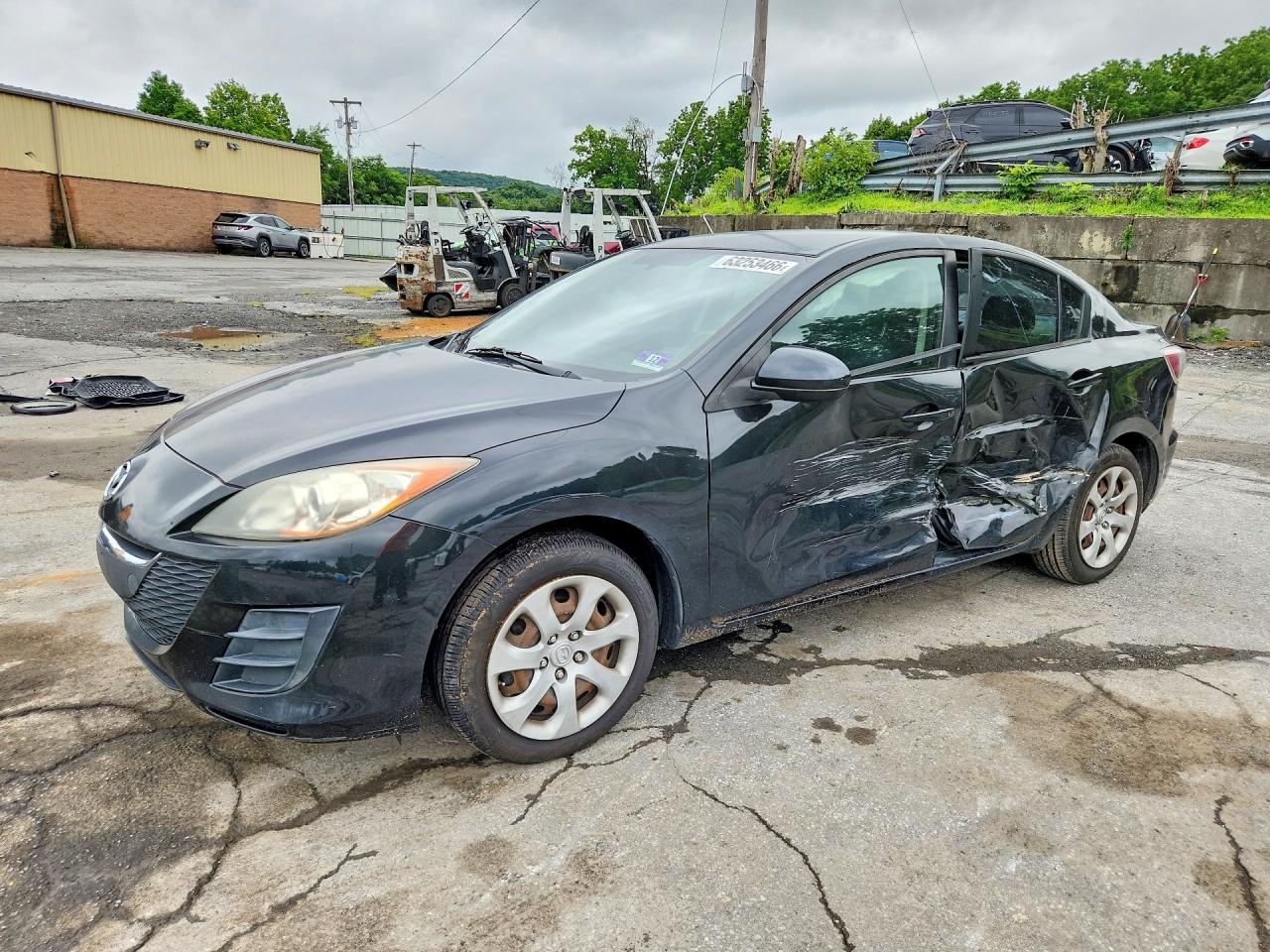 2010 Mazda 3 i Touring, VIN JM1BL1SF8A1228797 — Бок