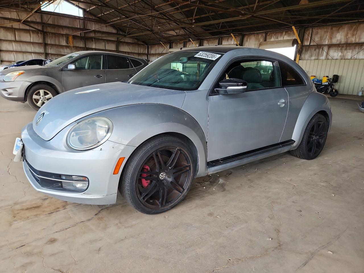 2012 Volkswagen Beetle Turbo, VIN 3VWVA7AT8CM614359 — Normal wear