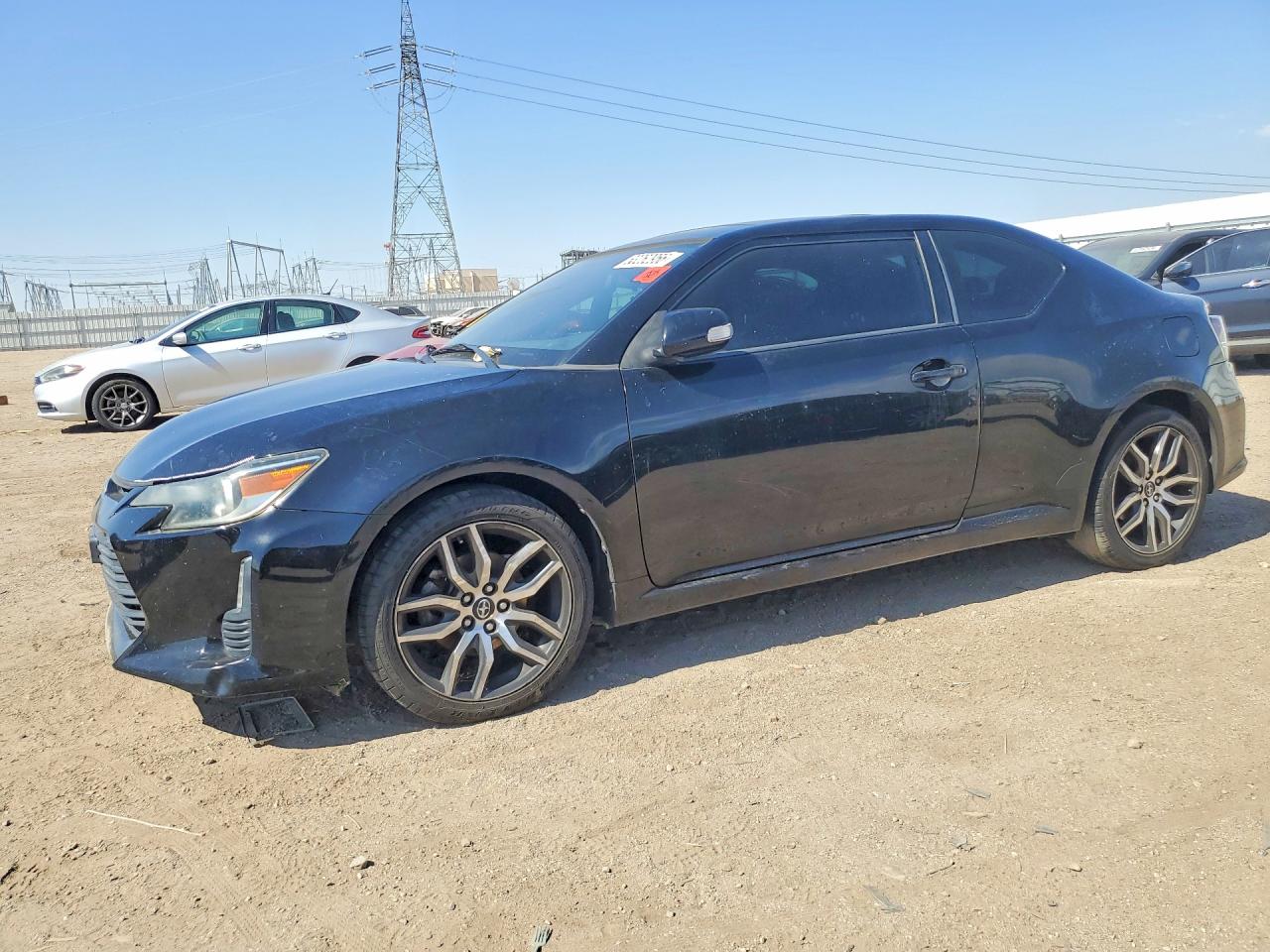2015 Scion tC, VIN JTKJF5C7XFJ009504 — Бок