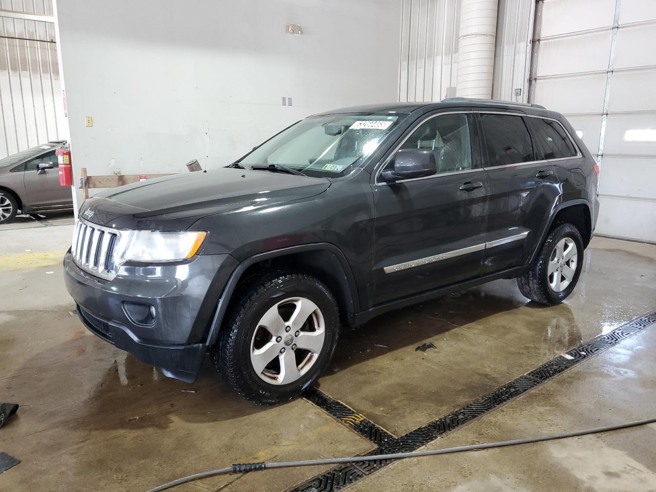 2011 Jeep Grand Cherokee Laredo, VIN 1J4RR4GG9BC570212 — Partial repair