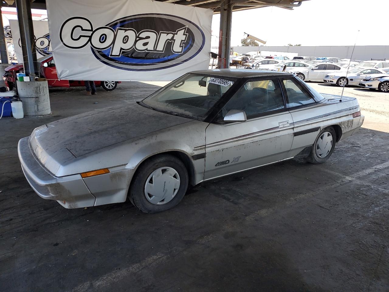 1989 Subaru XT, VIN JF1AX7320KD309697 — Minor dents and scratches